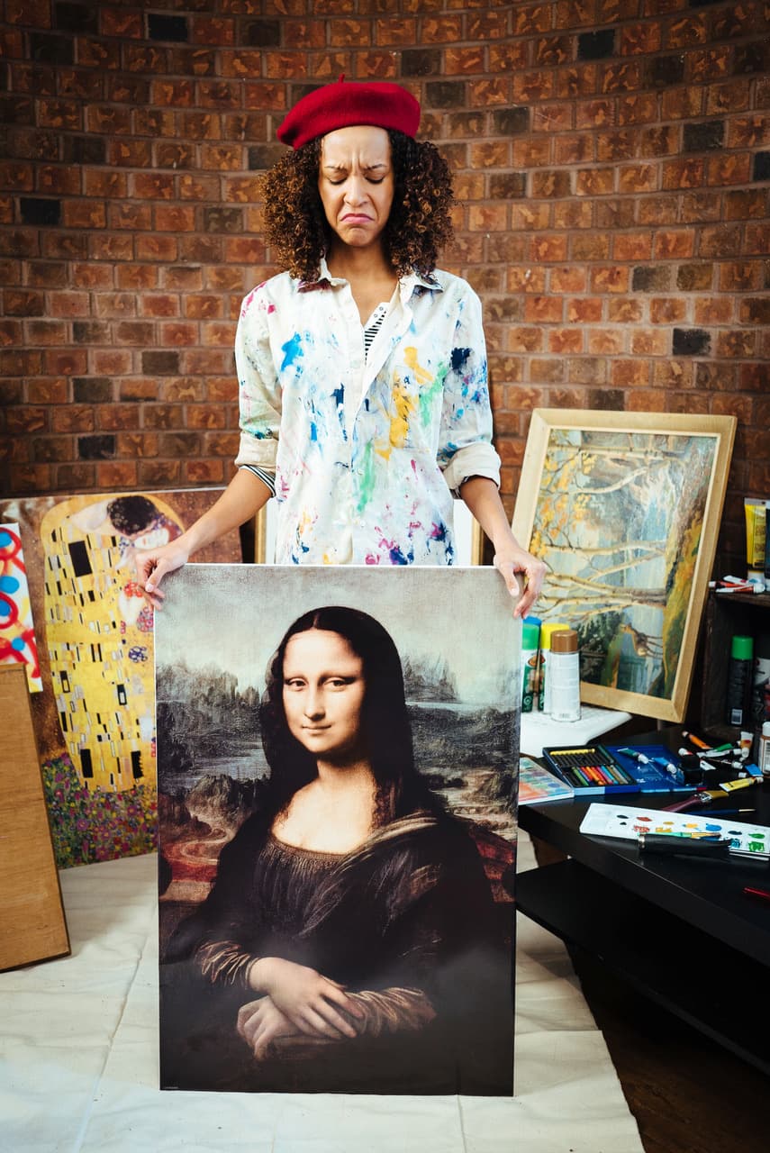 woman showing a painting