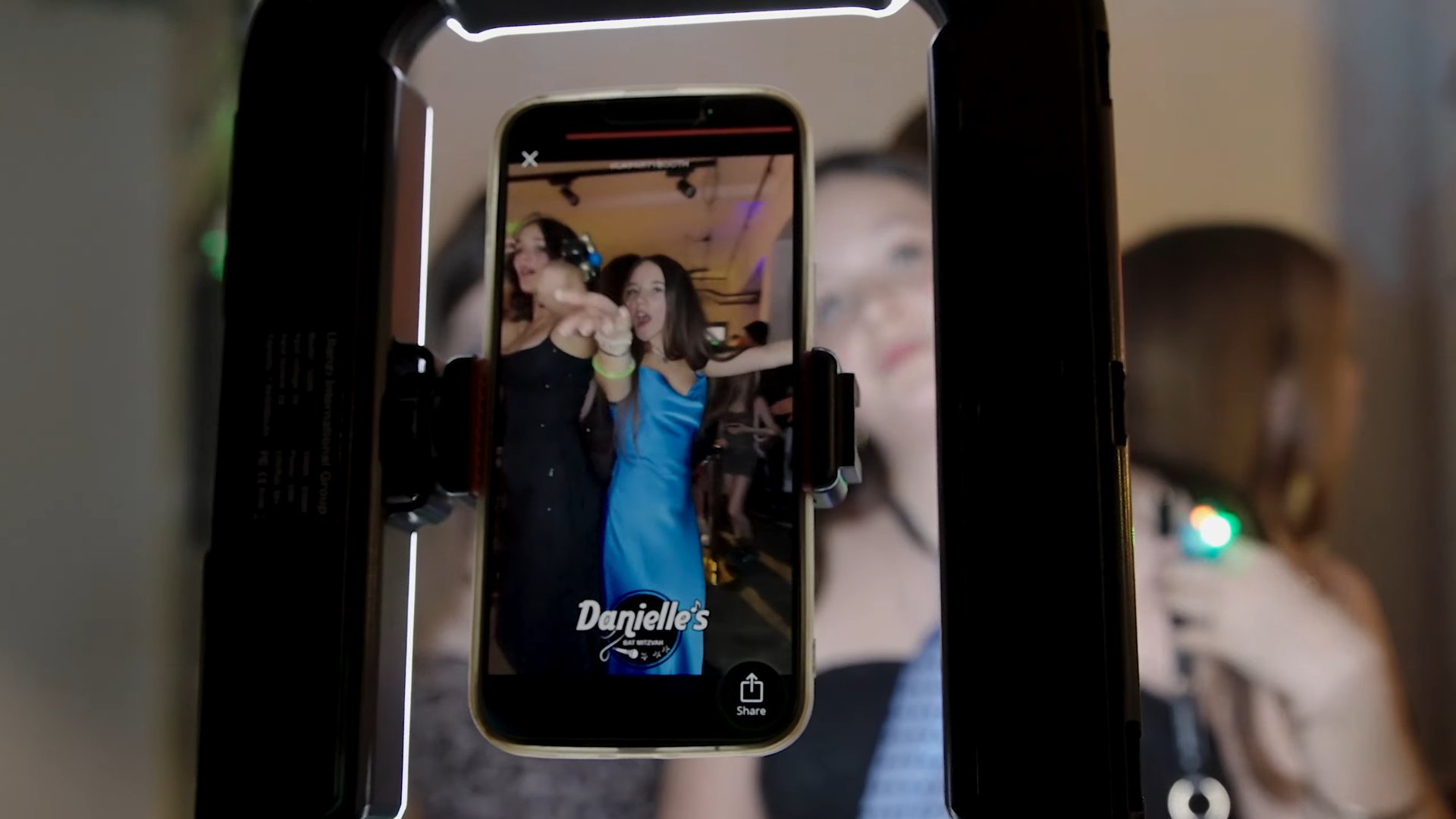 Guests using the branded 360 photo booth