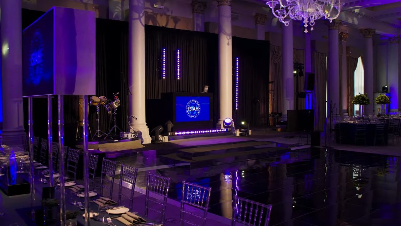 The Langham ballroom with mirrored dance floor and branded staging