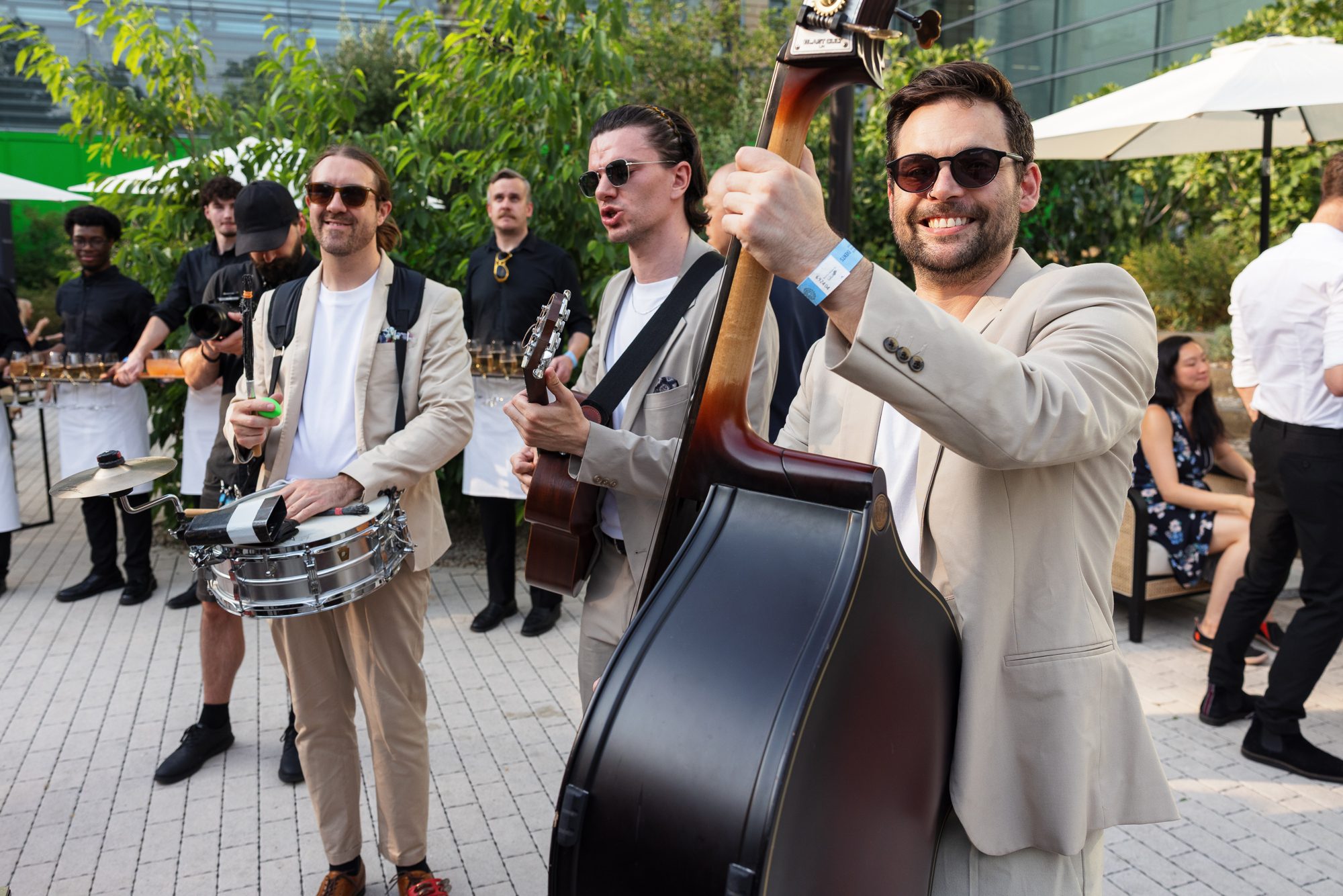 The acoustic roaming band performs in the Darwin Garden
