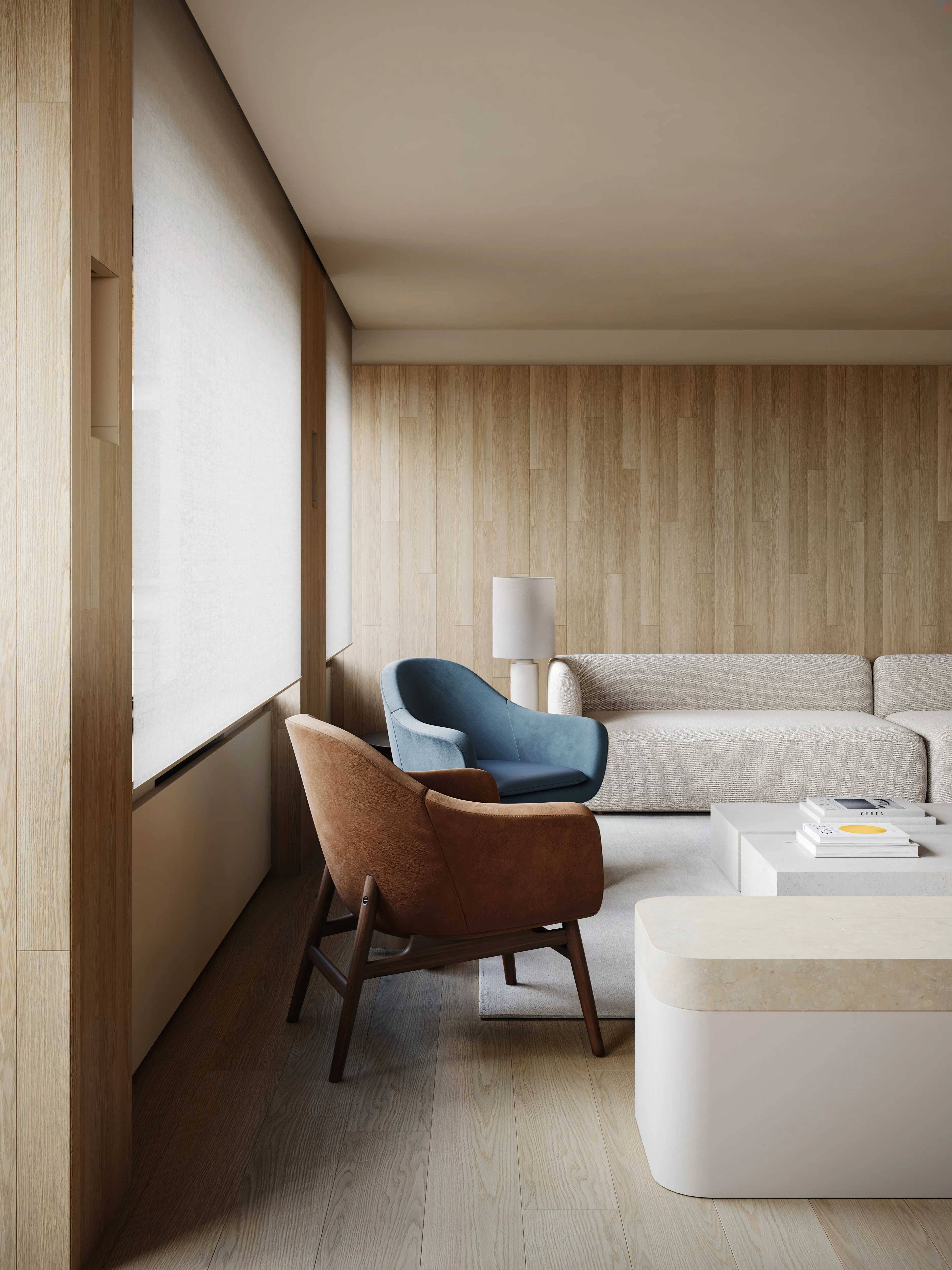 Modern living room with beige sofa, blue and brown armchairs, wooden walls, and white roller blinds.