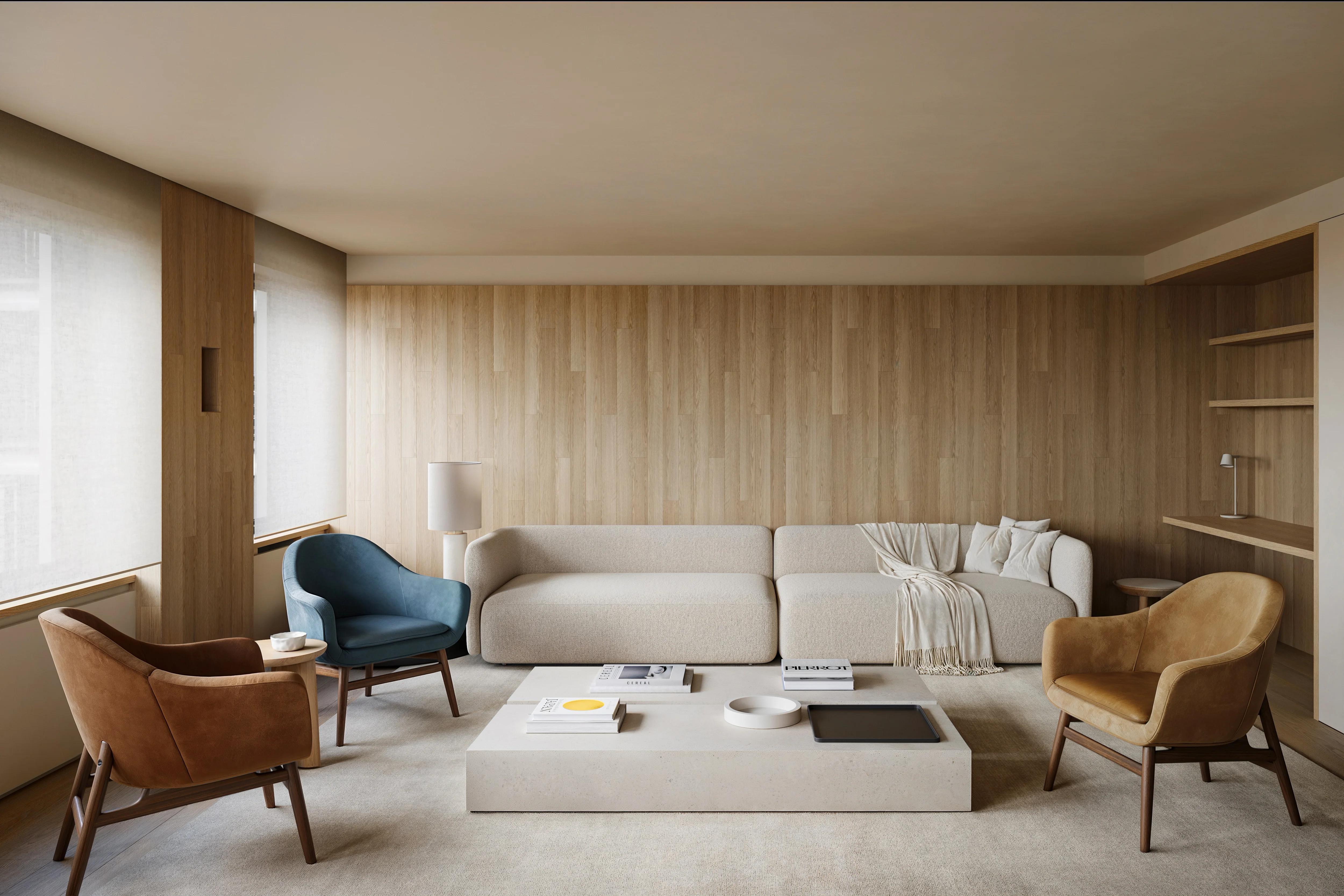 Minimalist living room with beige sectional sofa, wooden walls, a blue and two brown armchairs, and a low marble coffee table with books and decor.