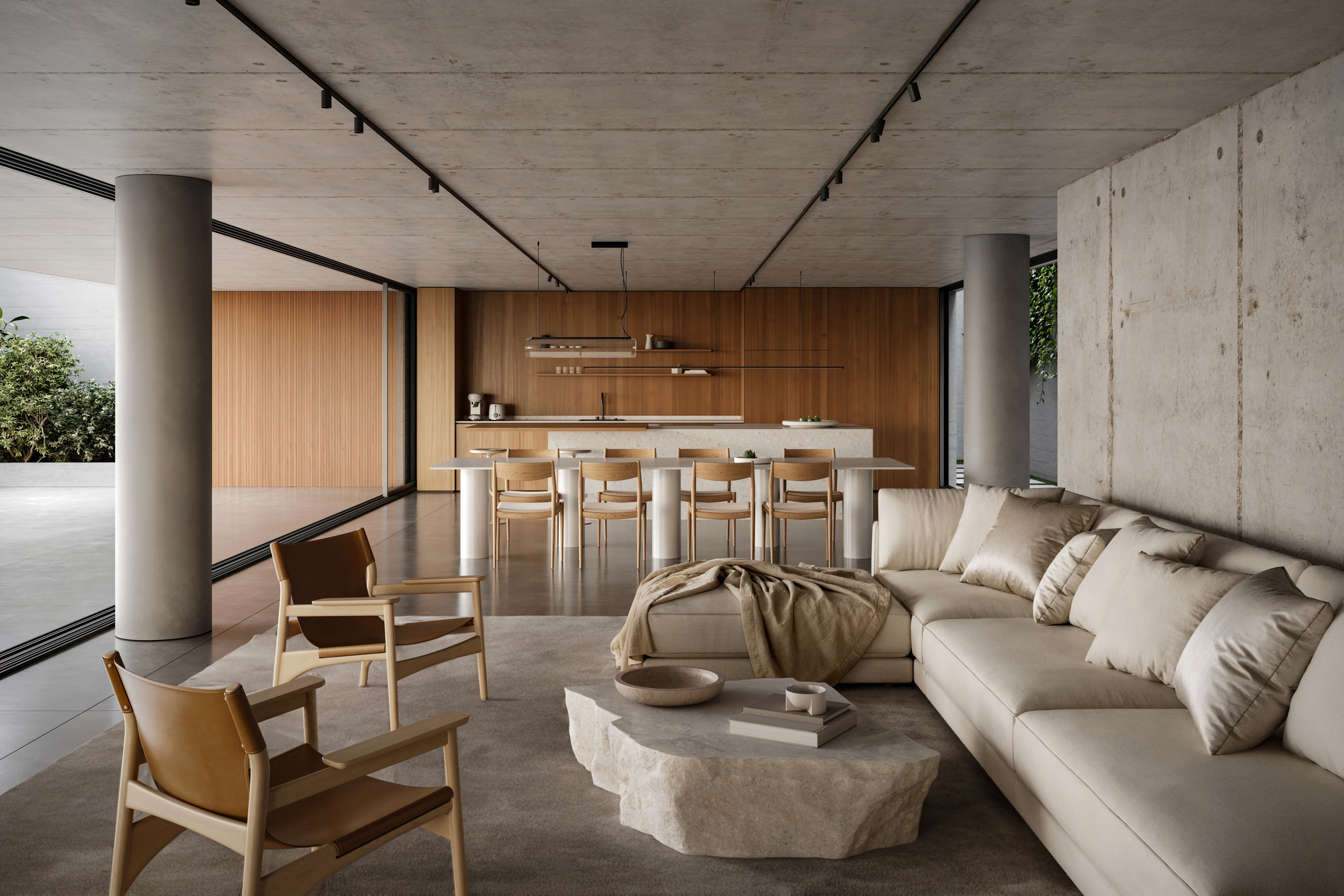 Modern open living space with beige sectional sofa, stone coffee table, two wooden armchairs, and dining area with wooden chairs and minimalist kitchen in background.