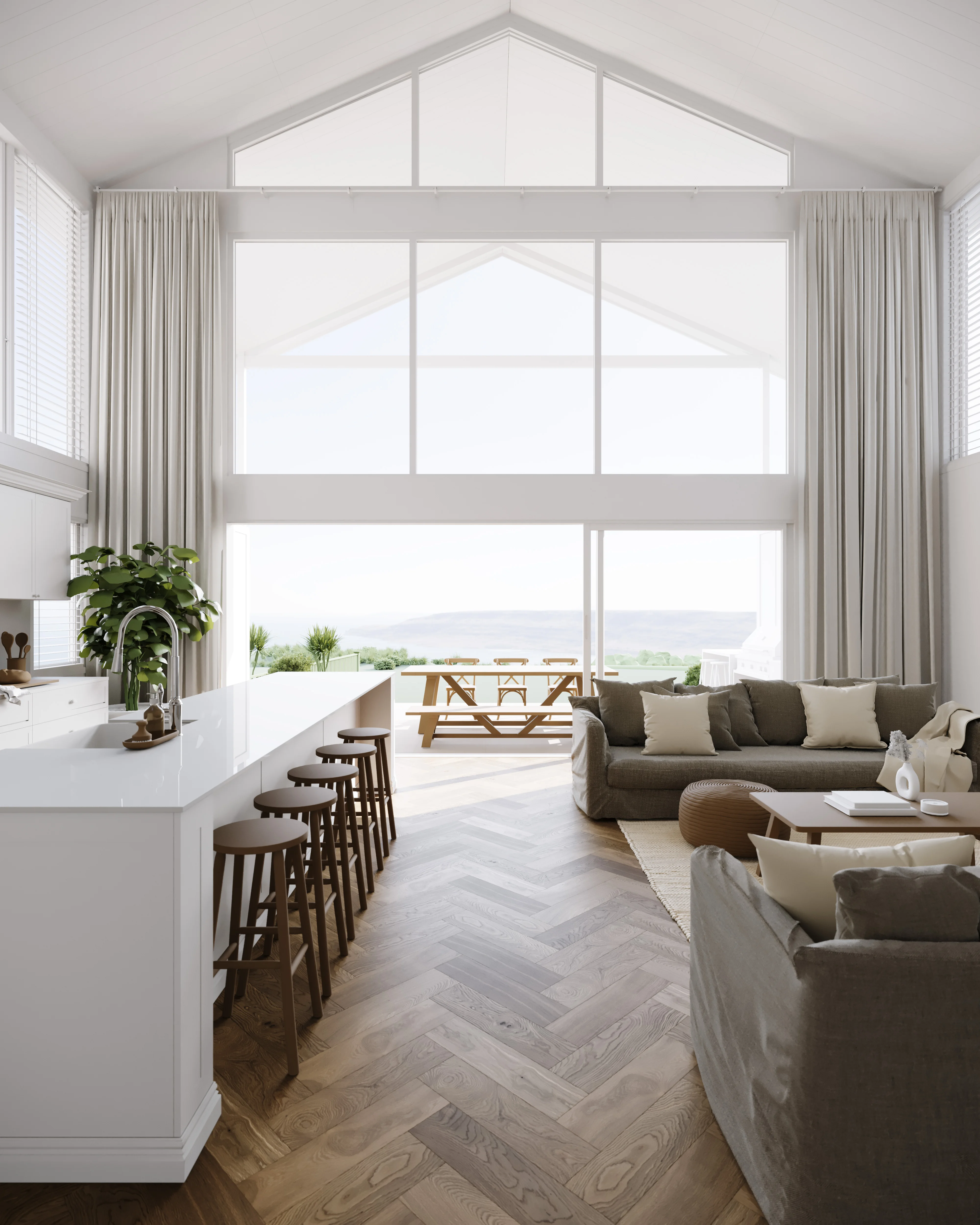 Bright modern open living room and kitchen with high angled ceiling, large floor-to-ceiling windows, and wooden herringbone floor.