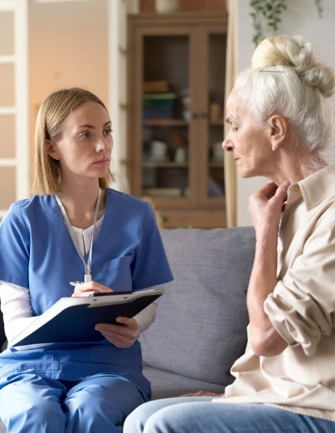 Mental Health nurse works with elderly patient