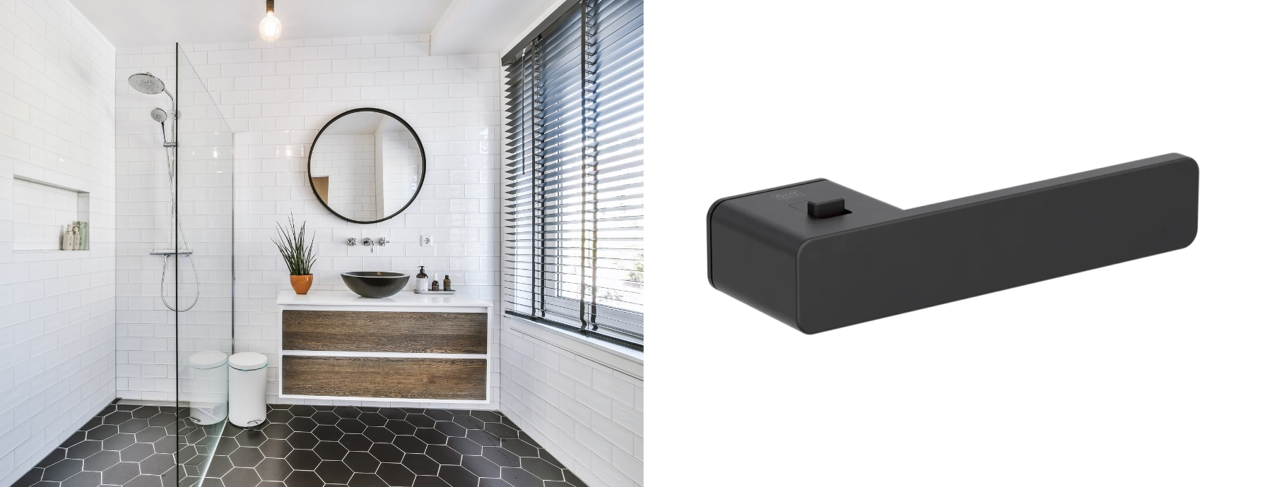 White bathroom with subway tiles, glass shower partition and round mirror with black frame. Griffwerk R8 door handle in matte black finish (graphite black) with integrating privacy switch/button.