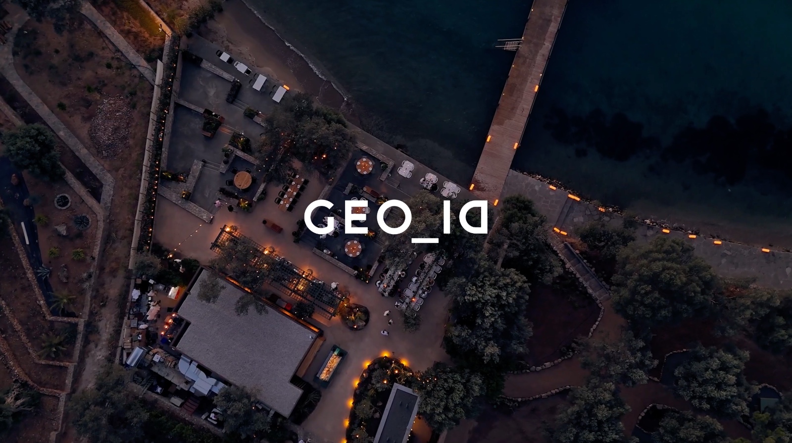 Triangle behind a mountain range made with structural grid like texture