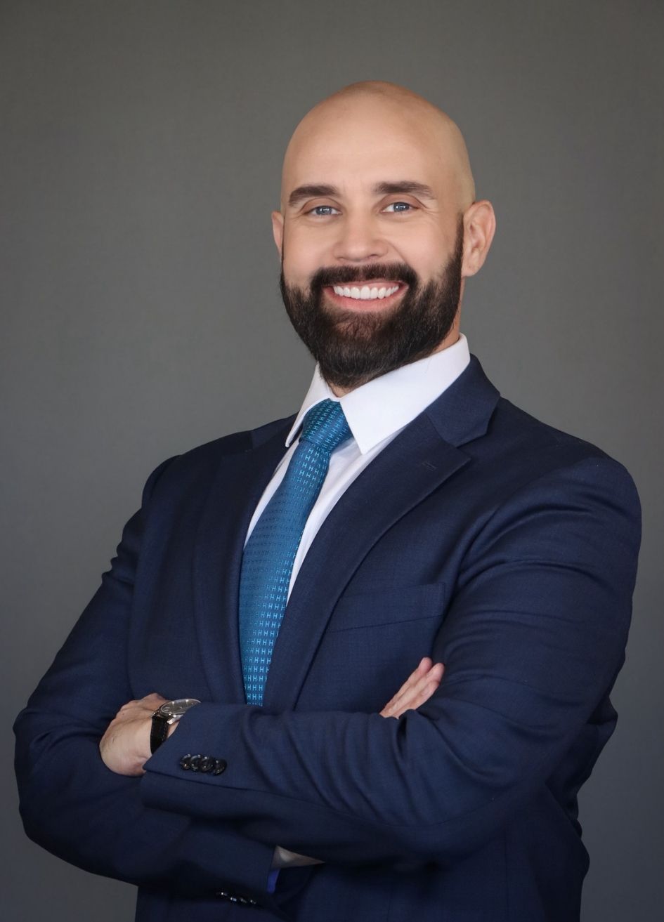 Professional headshot of Attorney Ryan Alexander used for firm marketing and billboard campaigns.