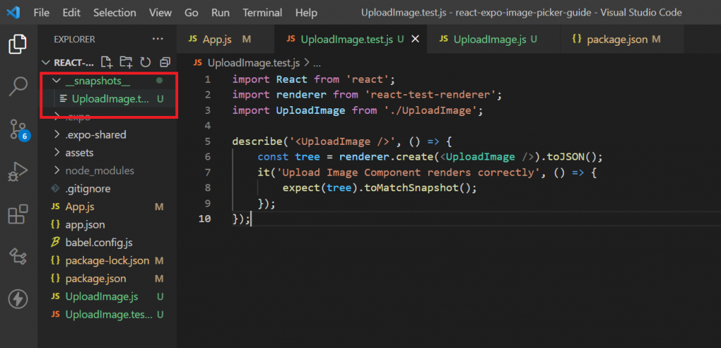 Image shows that the file "UploadImage.test.js.snap" was created