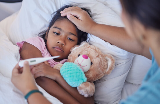 A parent caring for a sick child at home