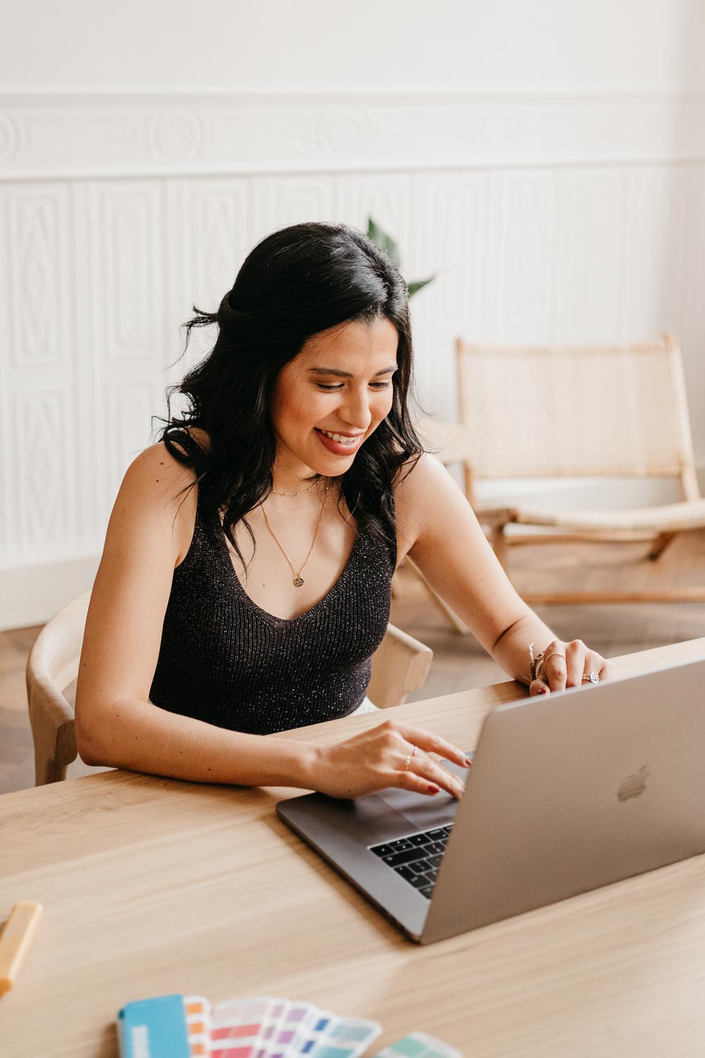 A designer smiling while on a meeting