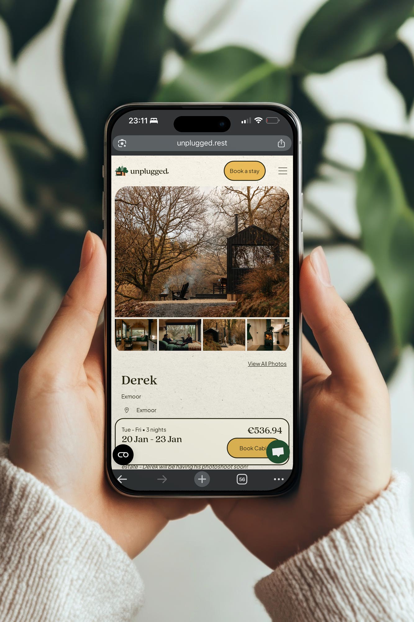 Smartphone displaying an Unplugged cabin detail page with images, dates, and pricing.