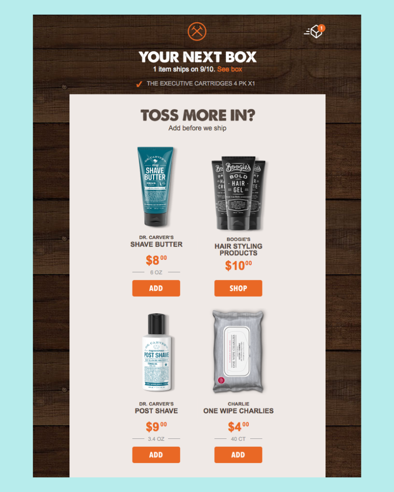 Dollar Shave Club upsell email example encouraging customers to add grooming products before box ships.