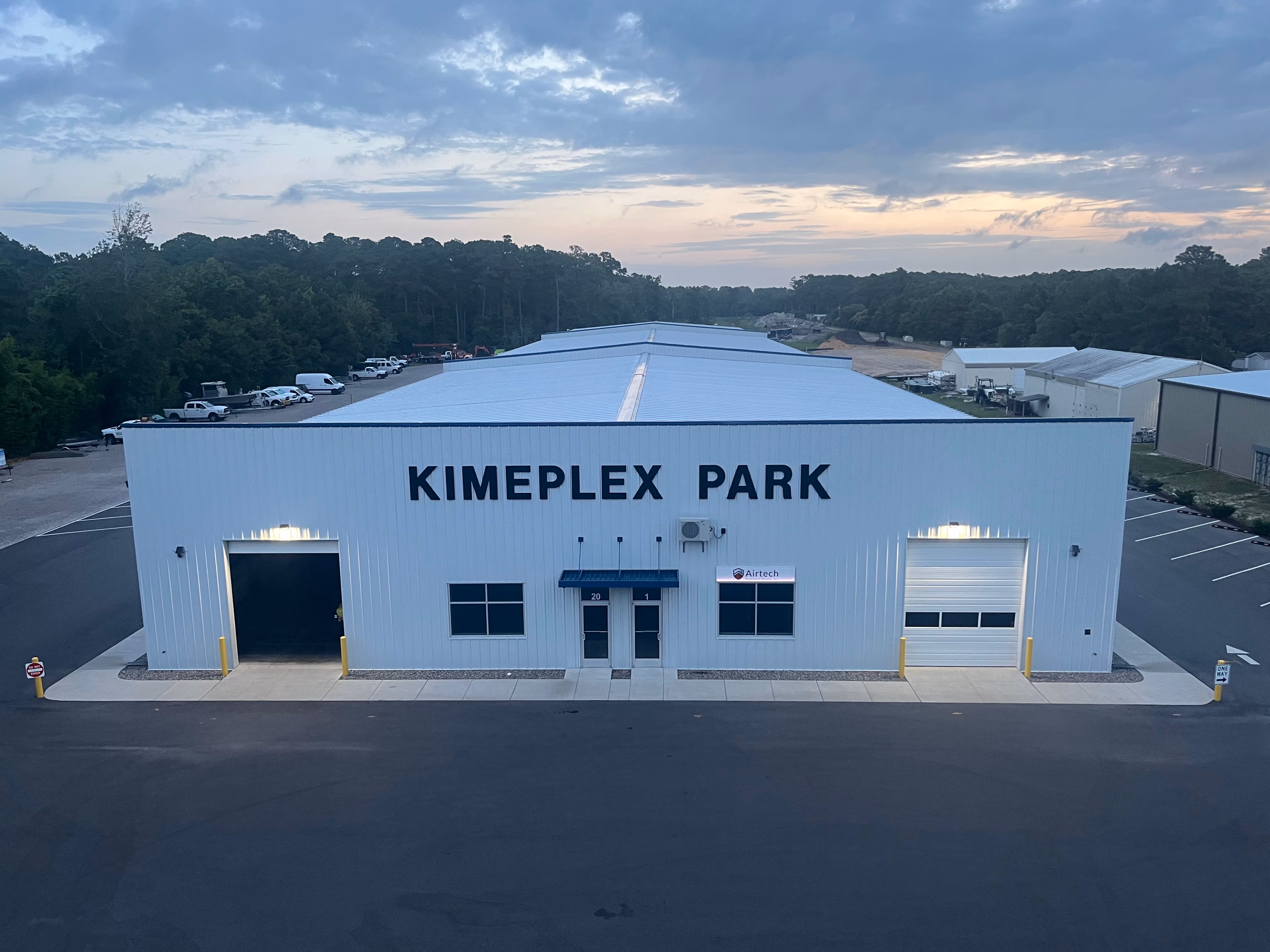 Aerial shot of Kimeplex park with a sunrise in the background