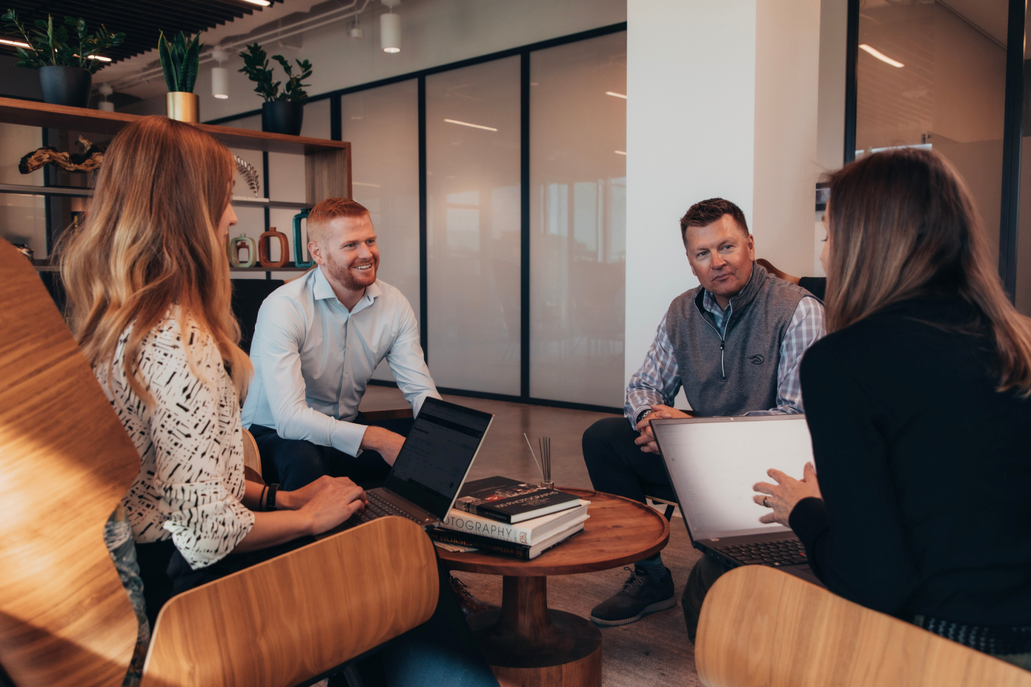 elevate dental employees talking in office