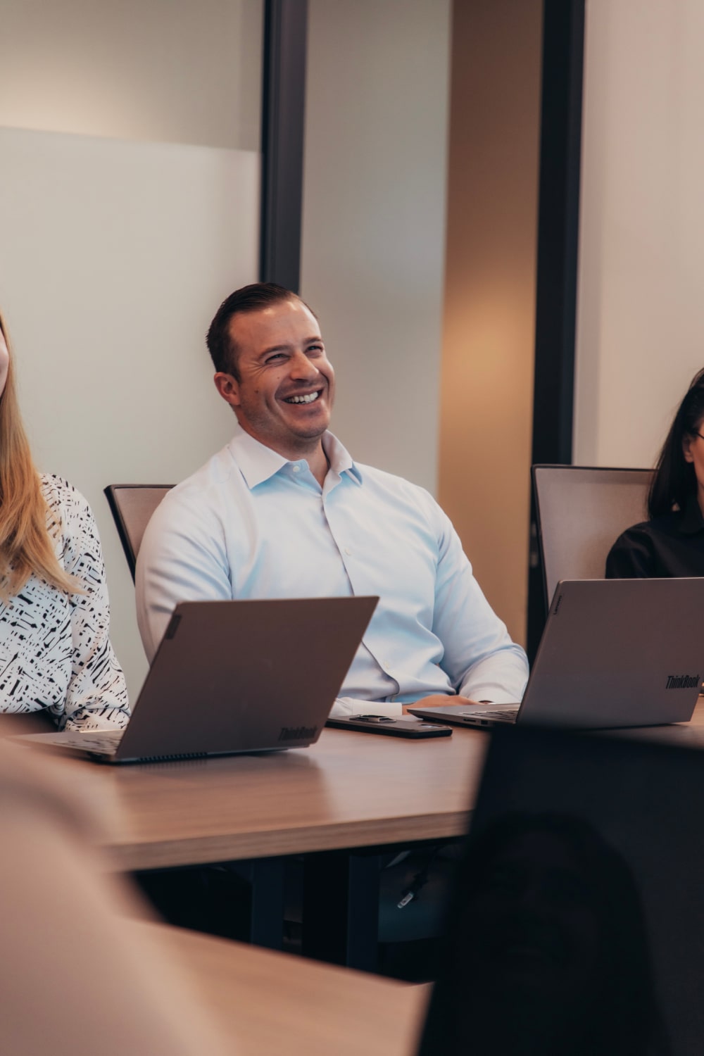 elevate office picture of staff member smiling

