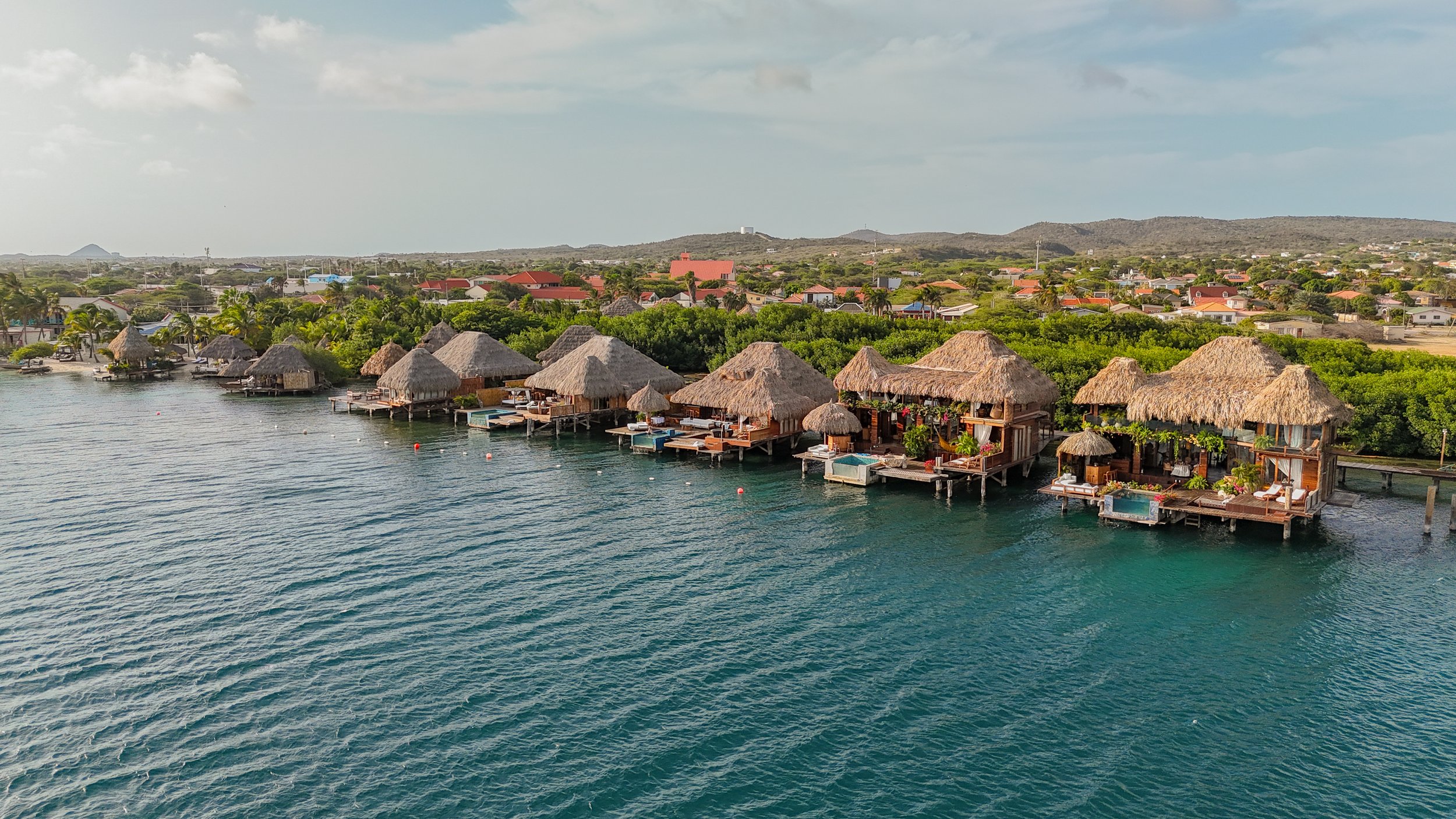 Aerial view of the overwater villas at Aruba Ocean Villas