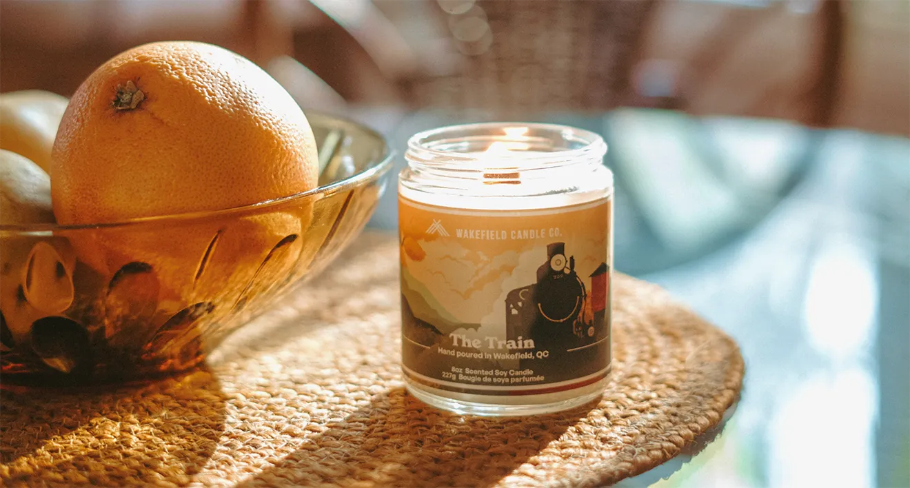 Wakefield Candle Co. The Train soy candle lifestyle photograph featuring warm vintage styling.