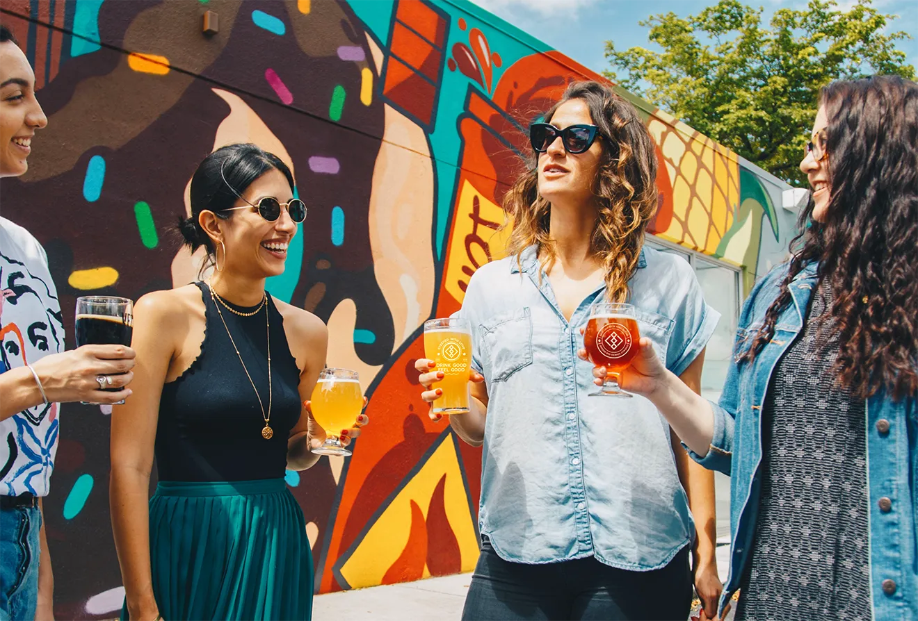 Artizen Craft Beverage Co. lifestyle photography featuring customers enjoying kombucha and iced tea."