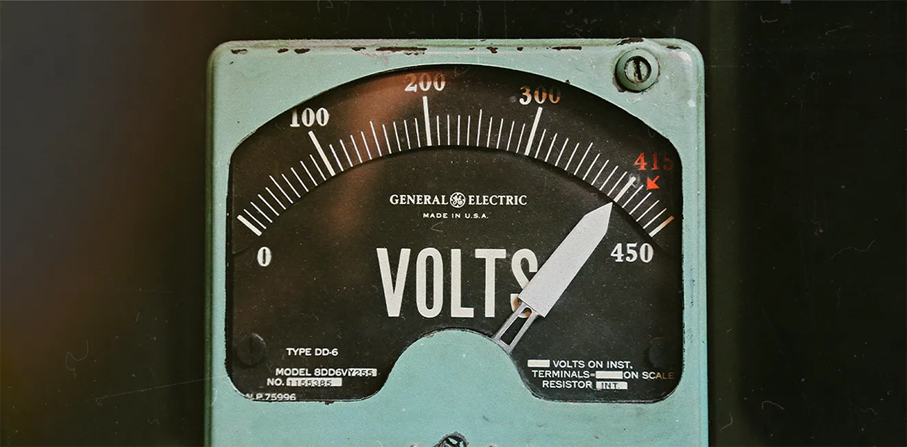 Vintage General Electric voltmeter used as Plateau Electric Co. brand photography inspiration.