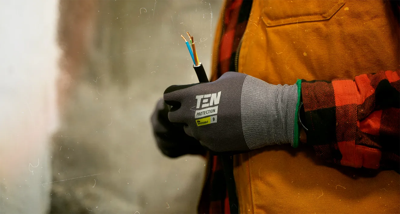 Plateau Electric Co. lifestyle photography showing electrician installing equipment with rugged trades aesthetic.