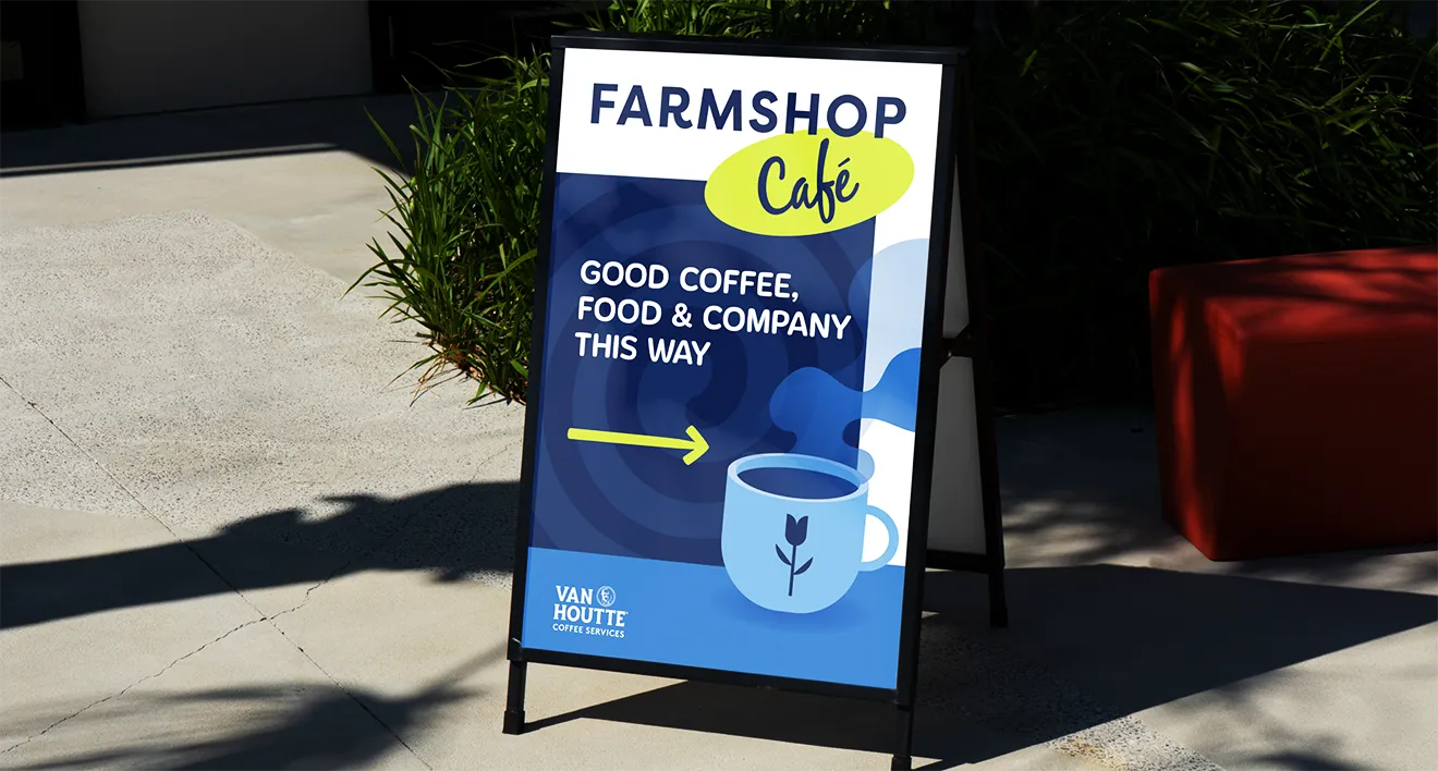 Saunders FarmShop cafe A-frame sign featuring bakery messaging and custom illustrated icons."