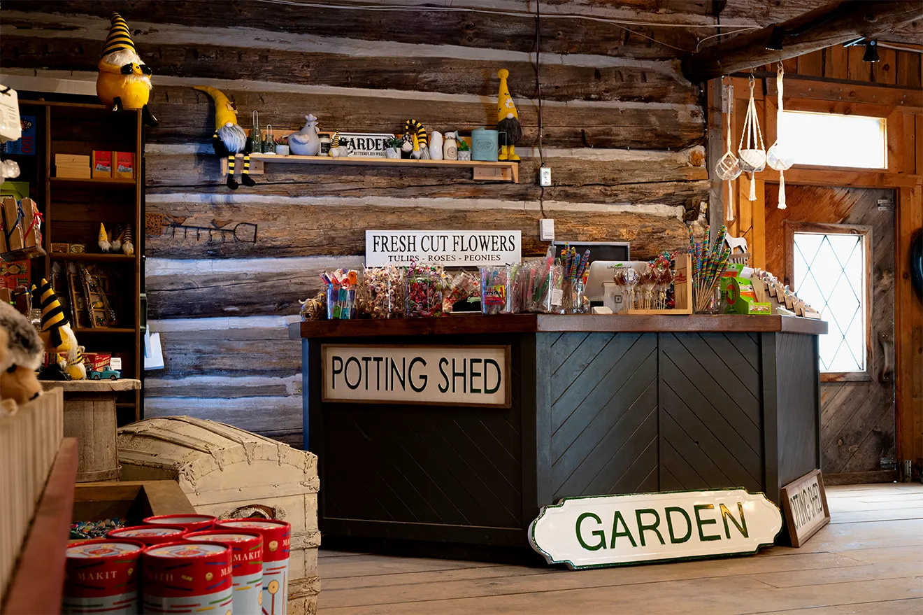Saunders FarmShop market event photography featuring rustic retail displays, desserts, and seasonal decor.