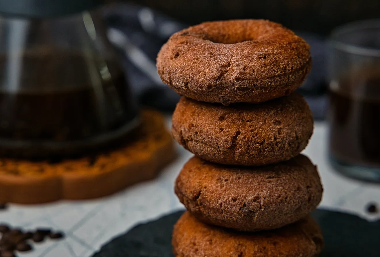 Saunders Farm cider donuts photography featuring fresh cinnamon sugar donuts from the farm bakery.
