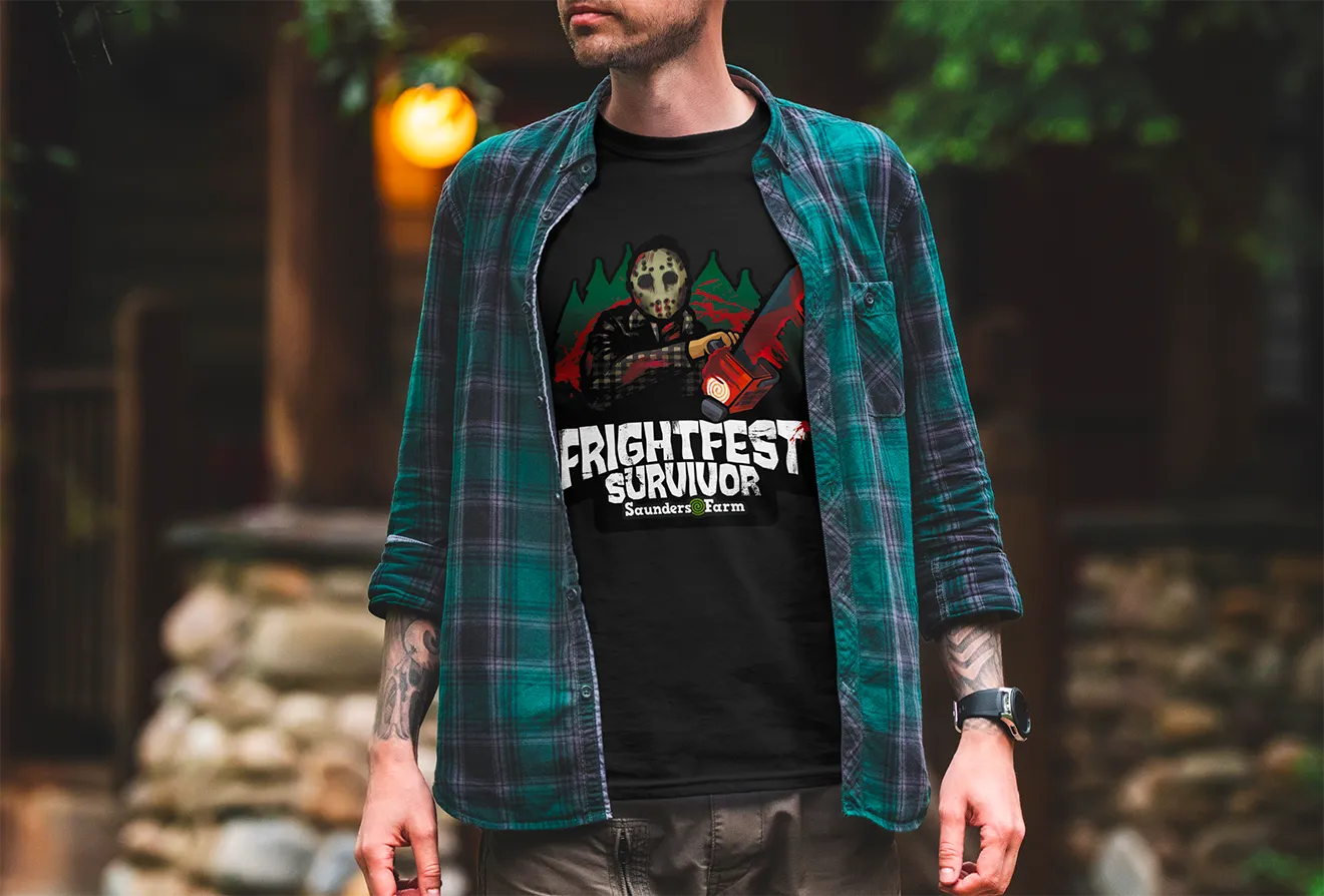 Black graphic t-shirt mockup with gritty Frightfest chainsaw vector illustration, designed by Hovski Studio.