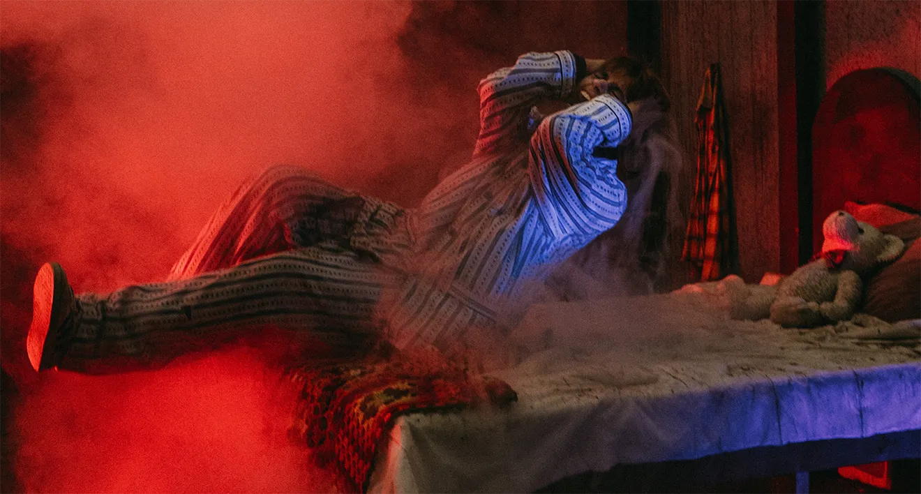 Dramatic low-light FrightFest actor performance photograph at Saunders Farm by Julie Sproule
