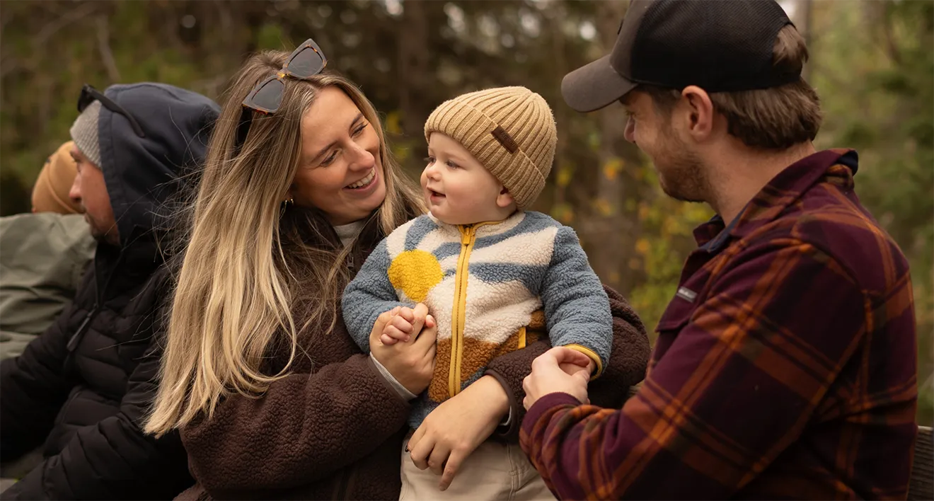 Family enjoying daytime PumpkinFest event at Saunders Farm, photographed by Julie Sproule.