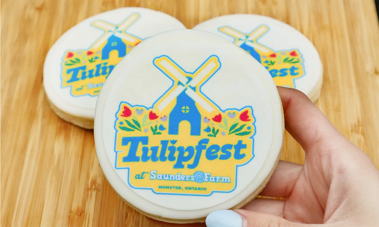 Custom sugar cookie with edible print of the Tulipfest windmill logo designed by Hovski Studio.