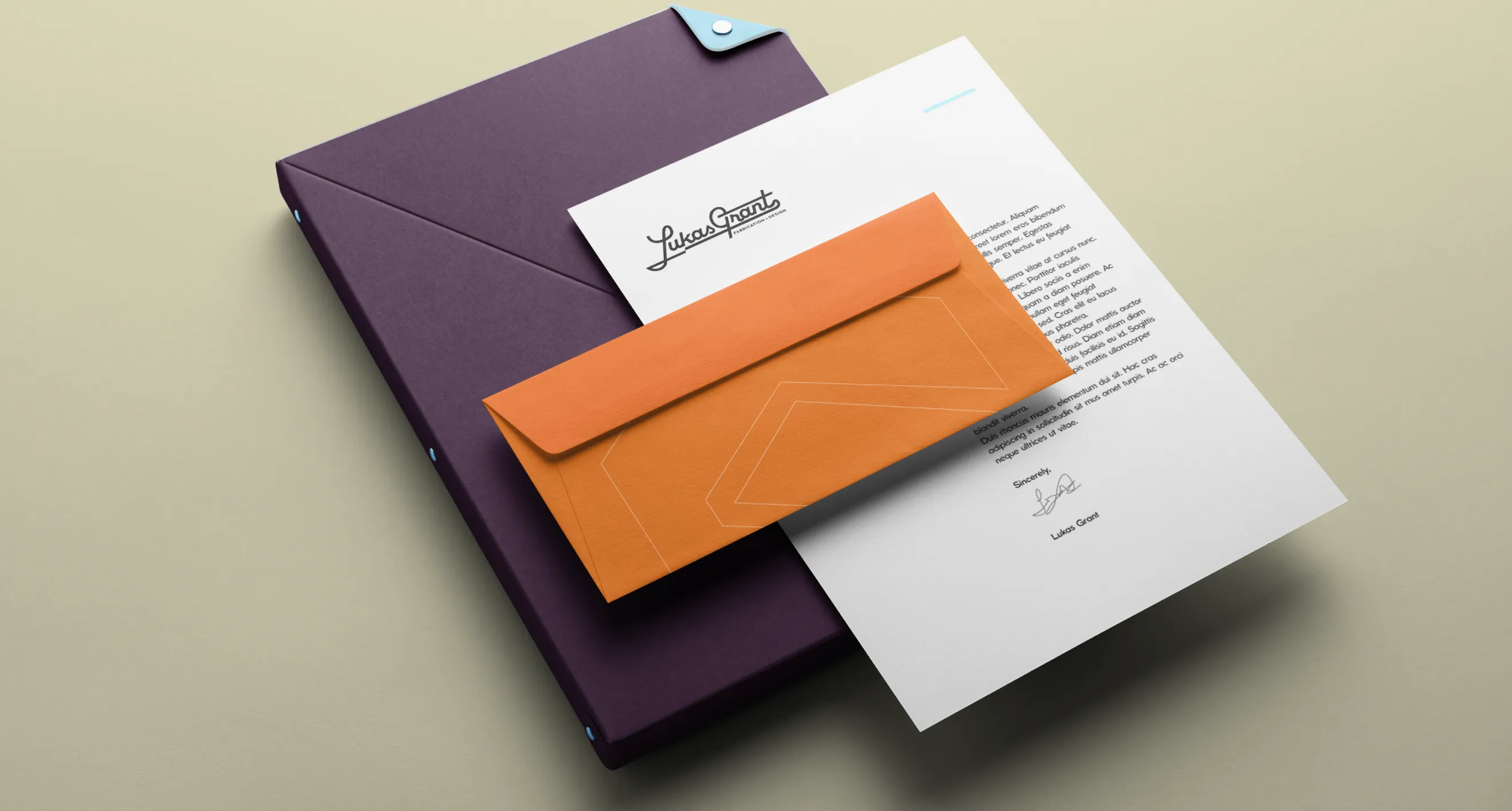 Printed letterhead, orange envelope, and purple folder stationery suite designed by Hovski Studio.