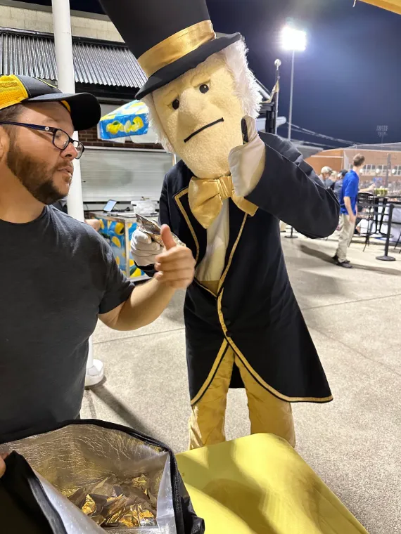 The Demon Deacon stopping by the Flatland stand