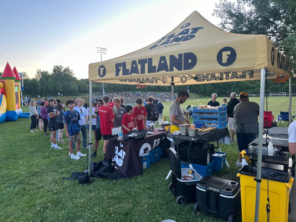 Flatland tent serving a festival crowd