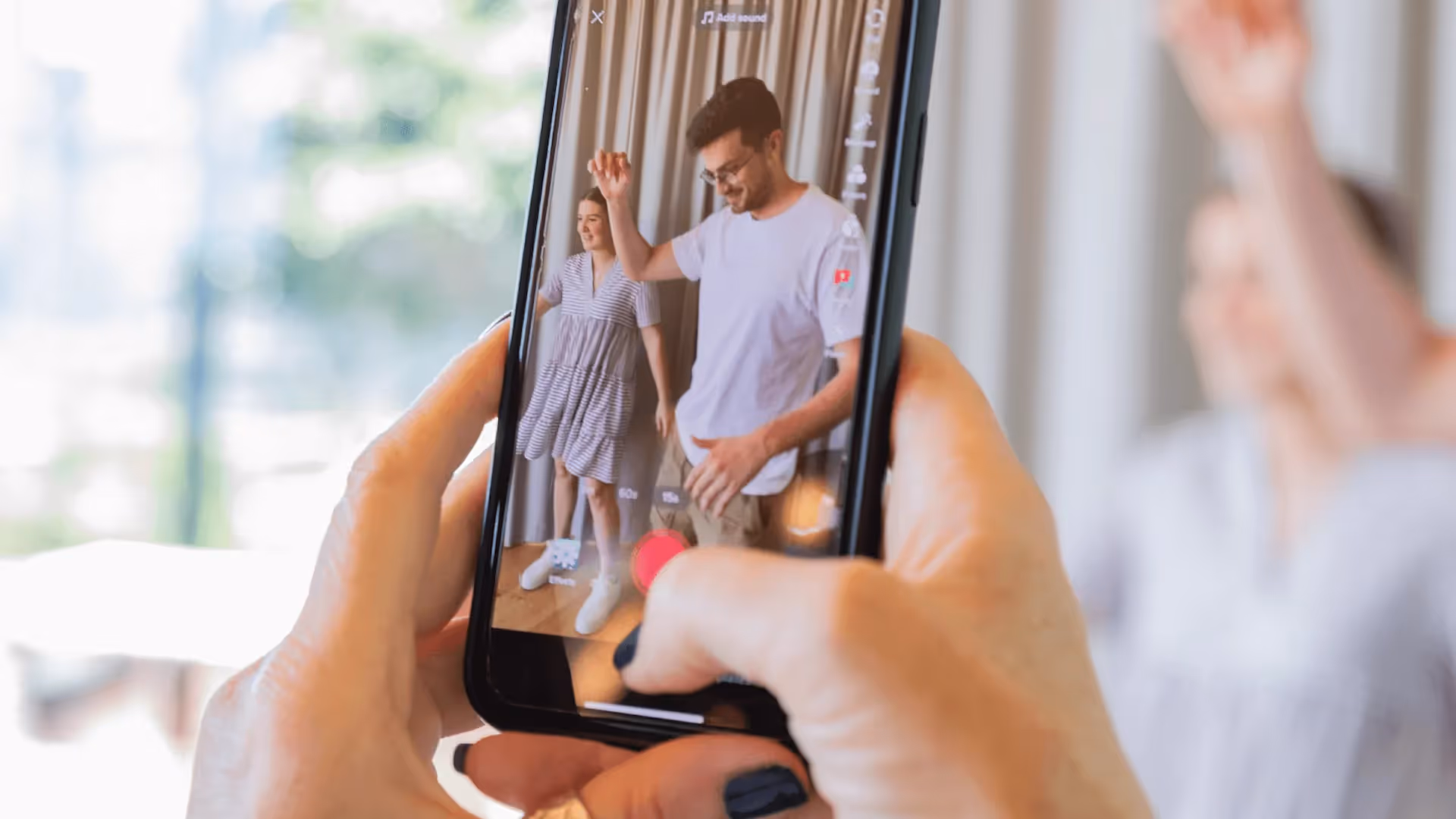 BTS shot of videographer capturing TikTok content