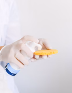 skin care foam sprays on sponge