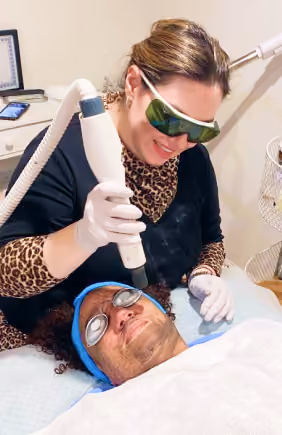 woman doing facial laser hair removal