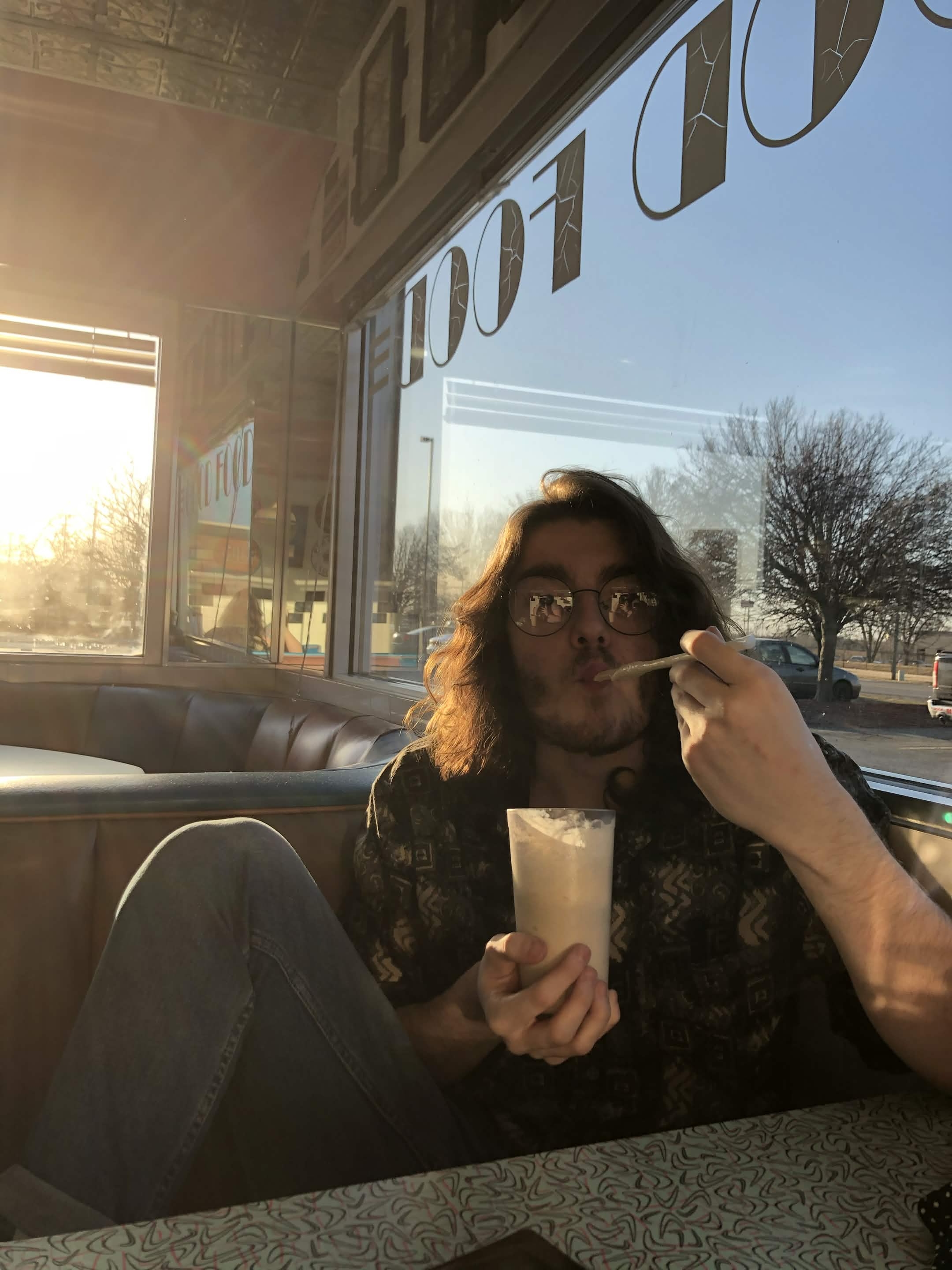 The Coolest Game Designer this side of the Atlantic Ocean drinking a very fine milkshake.