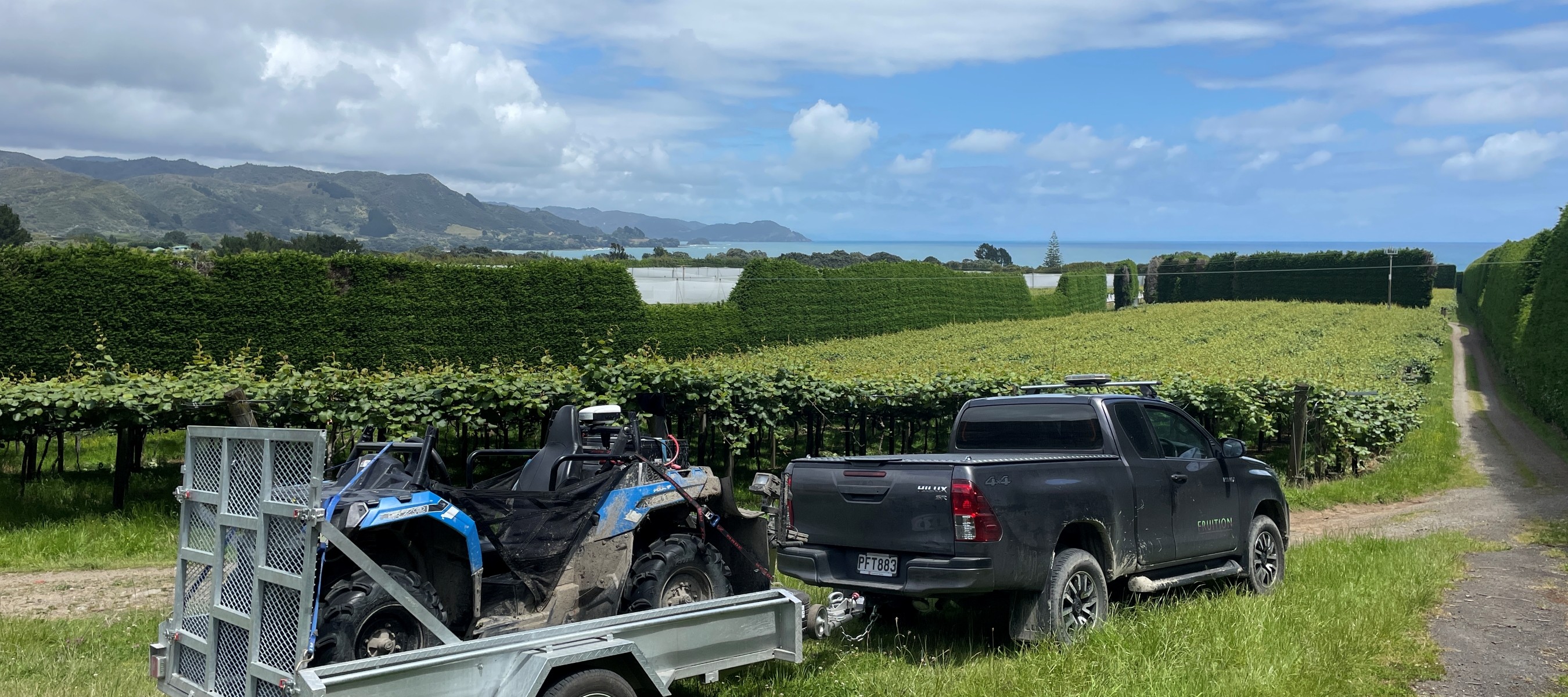 Green Atlas Cartographer arriving at an Eastern Bay of Plenty kiwifruit orchard.