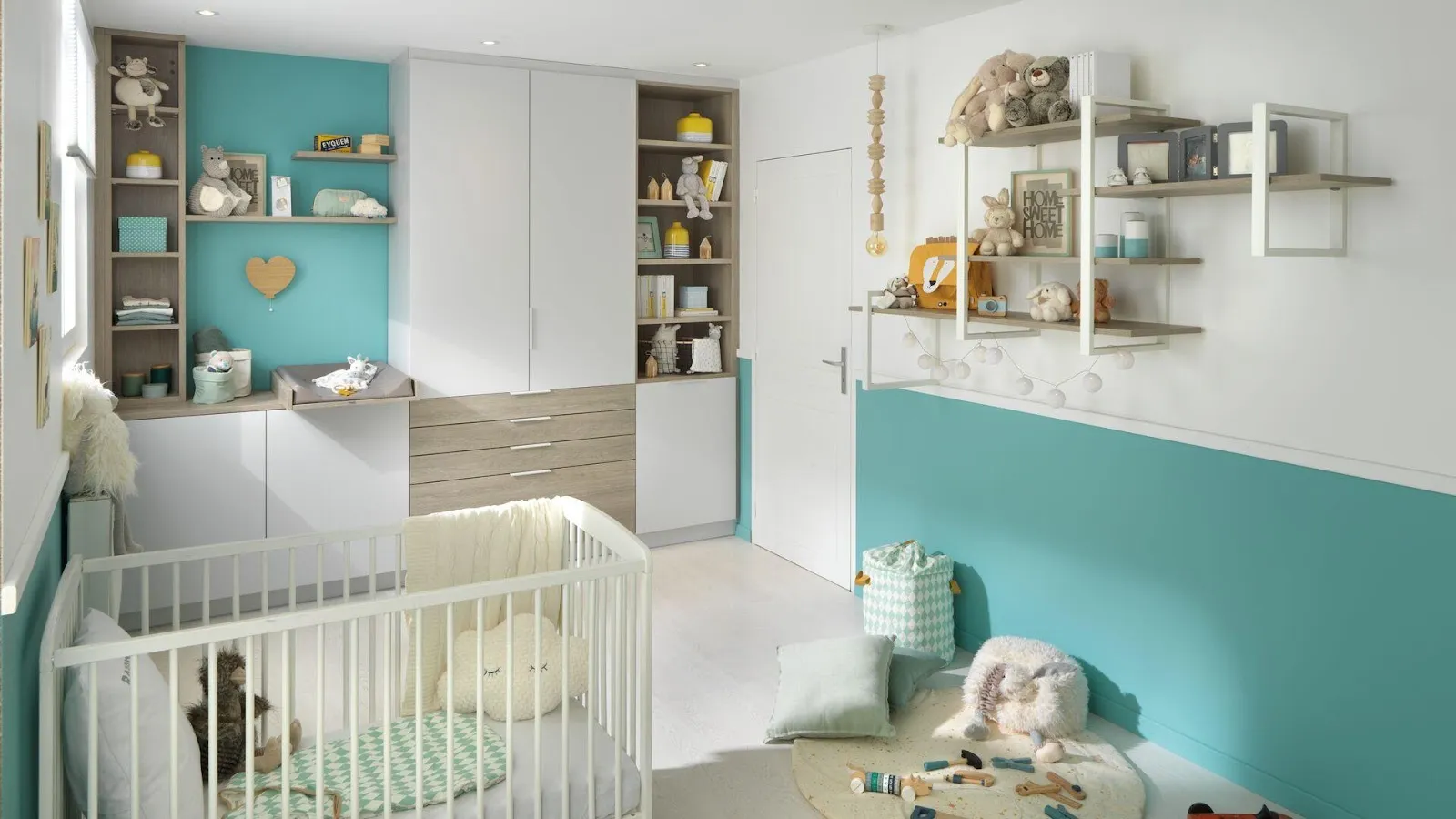 Une chambre d'enfant parfaitement aménagé avec des couleurs blanches et bleues.