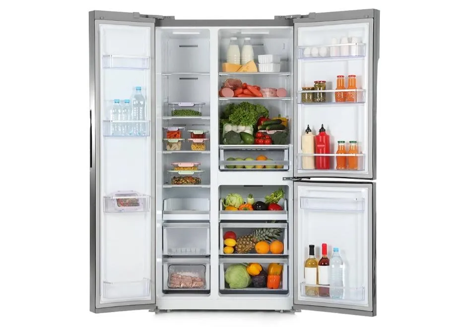 Photo d'un réfrigérateur combiné rempli de produits frais