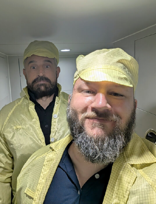 two men at contract manufacturing plant