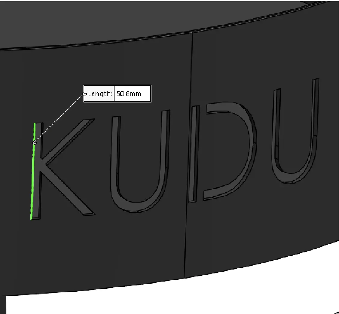 Detail shot of KUDU logo on open fire grill in CAD