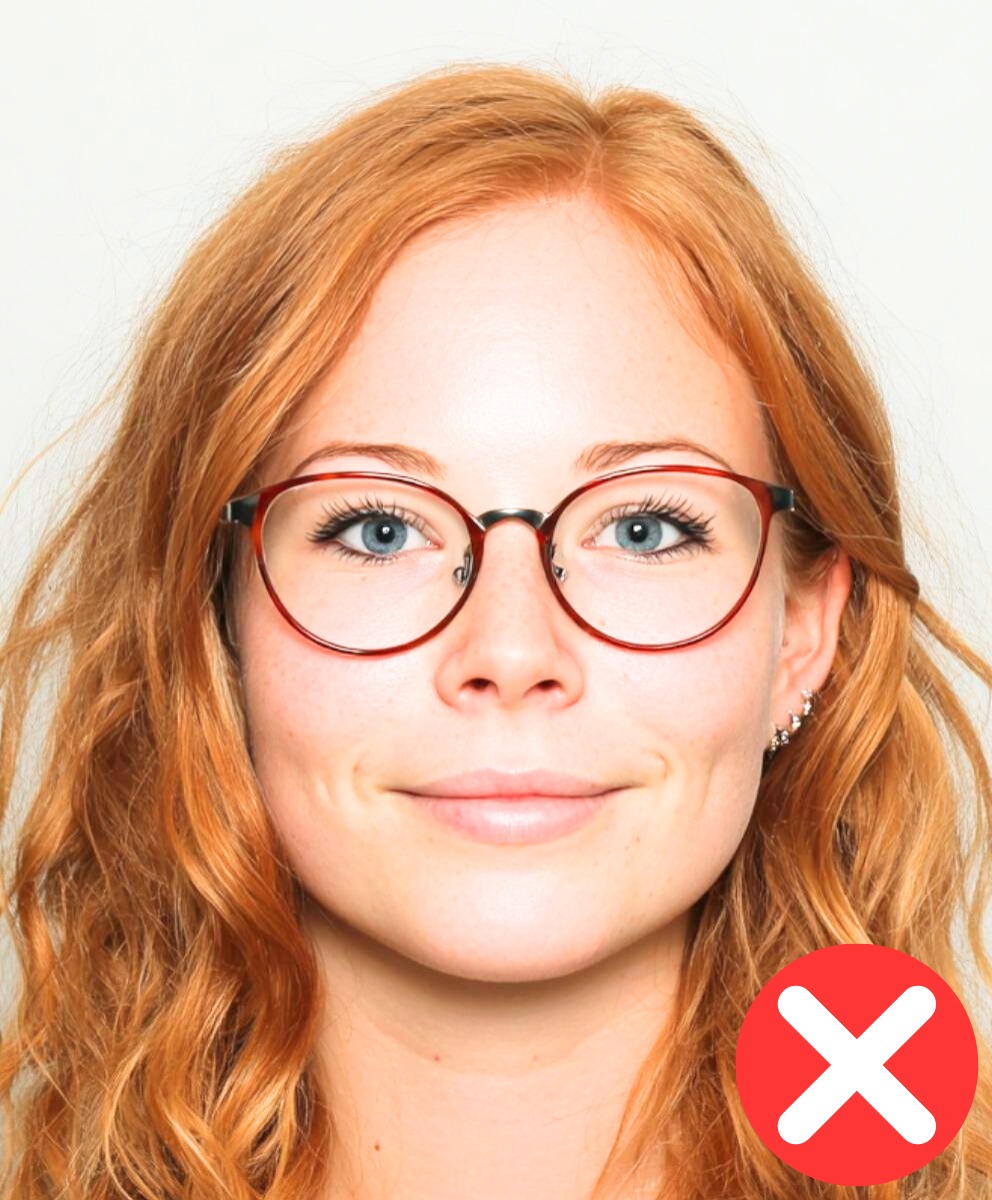 A foto do passaporte está exposta com muita luz