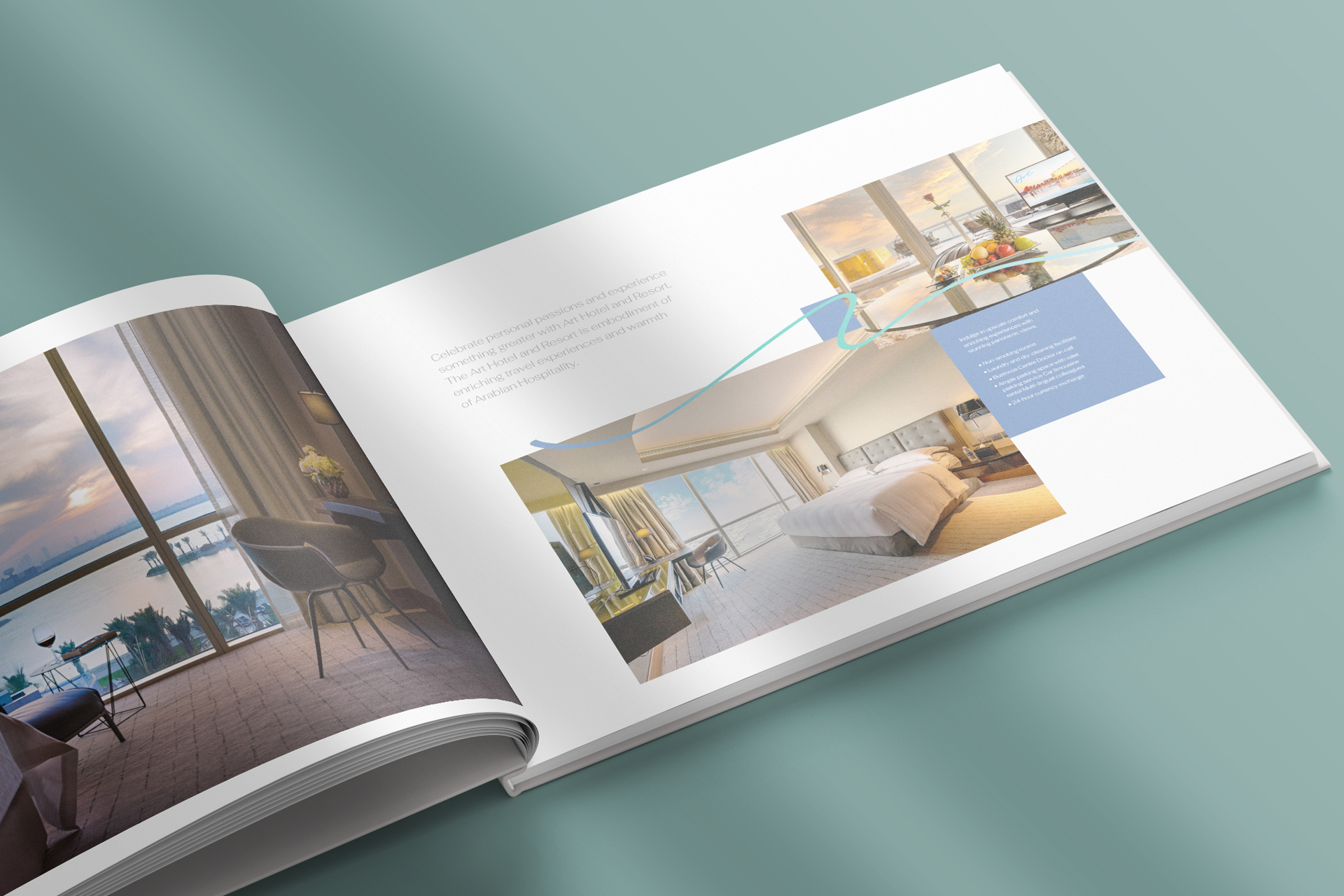 Open booklet displaying photos of a hotel room with a large bed and a seating area with a view of palm trees and water through floor-to-ceiling windows.