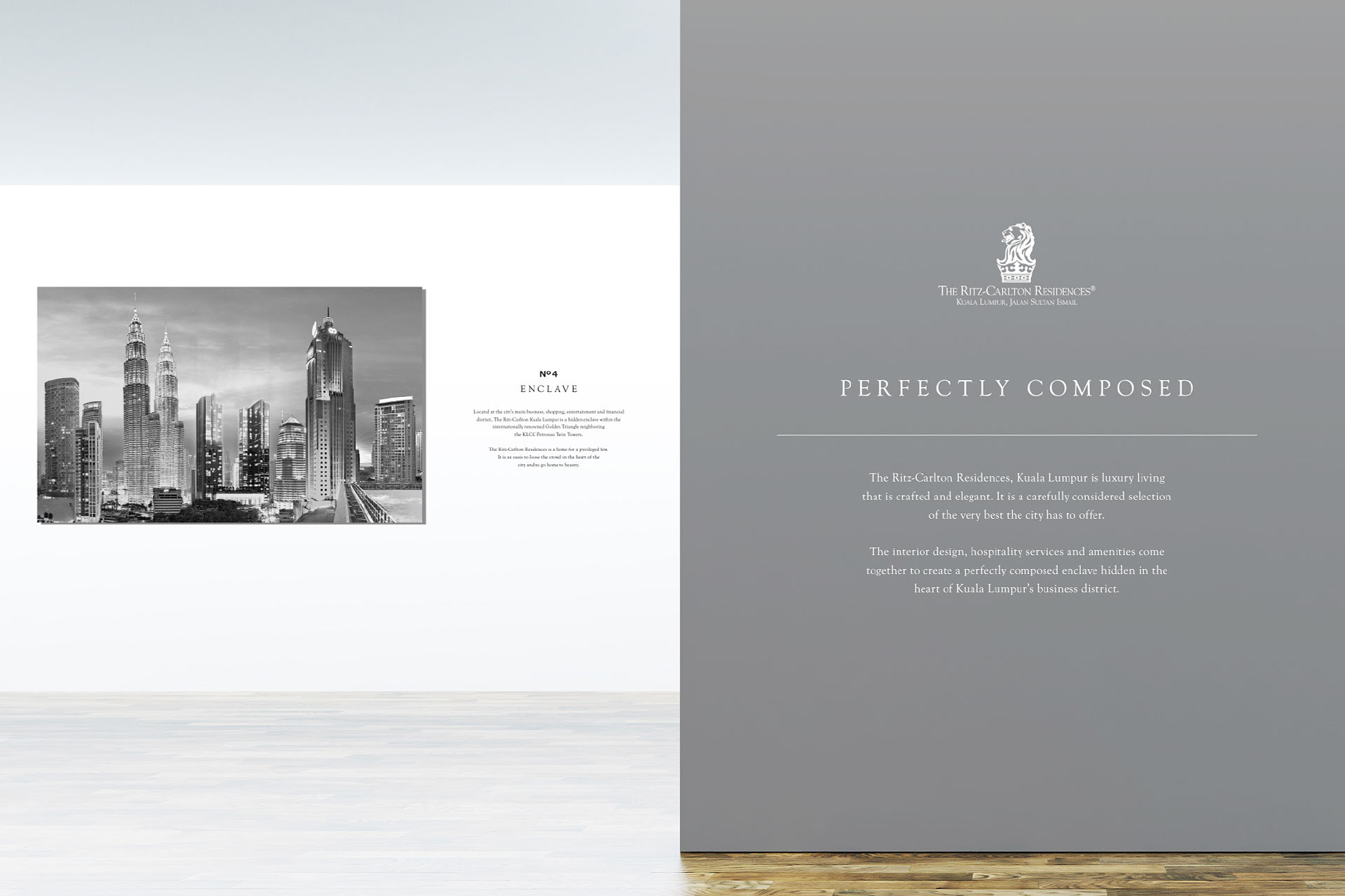 Wall display featuring a black and white cityscape photo of Kuala Lumpur on the left with text about The Ritz-Carlton Residences Enclave, and on the right a grey panel with The Ritz-Carlton Residences logo and the headline 'Perfectly Composed' describing luxury living in Kuala Lumpur's business district.