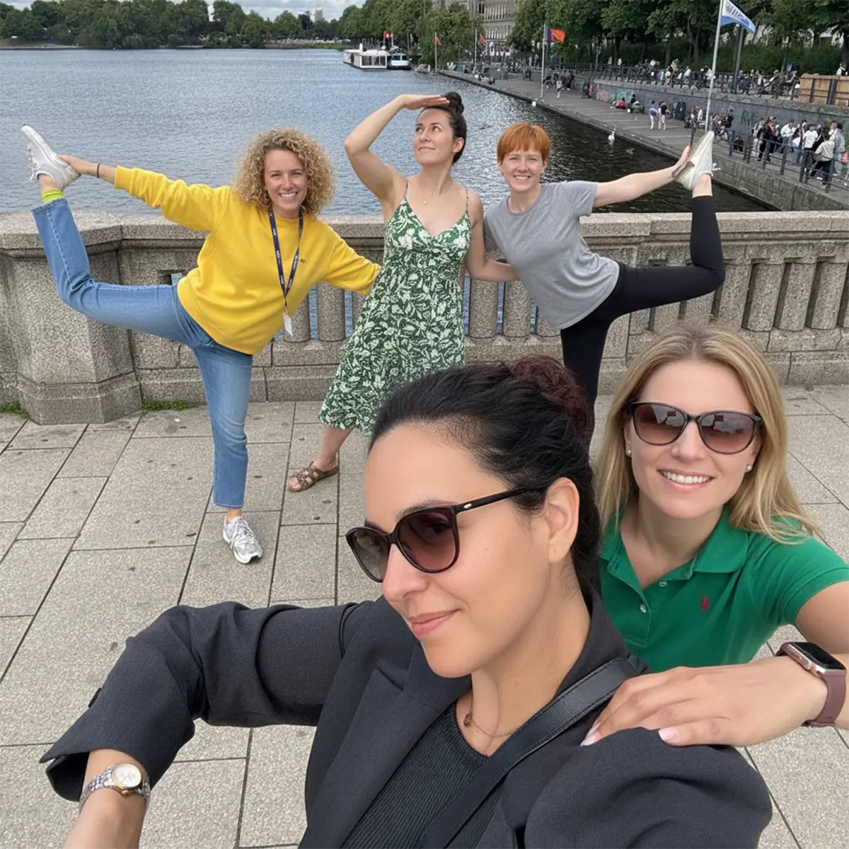 Colleagues laughing during a scavenger hunt challenge in Hamburg's streets