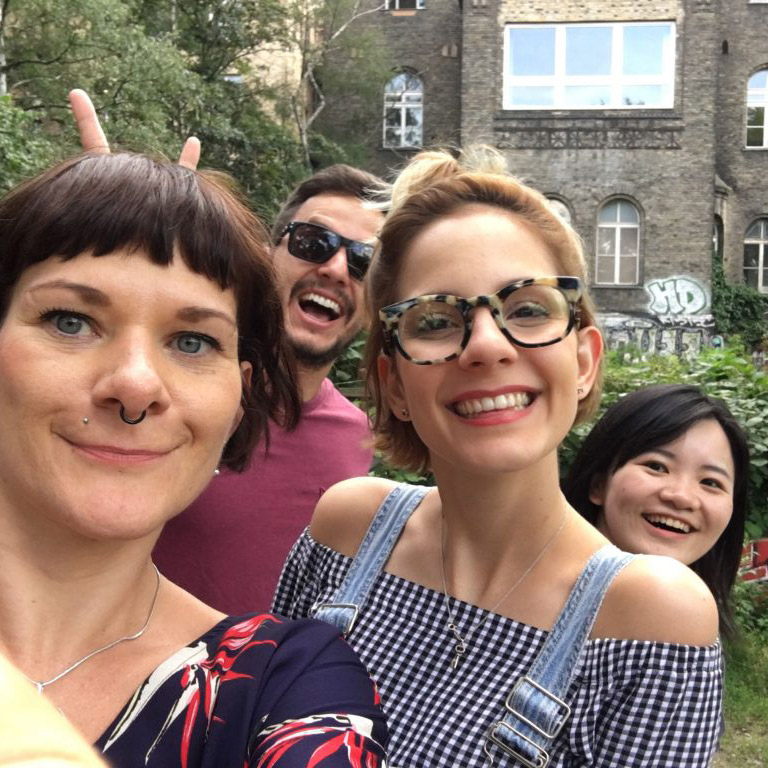 Group of colleagues laughing during an Urban Challenger city rally in Berlin