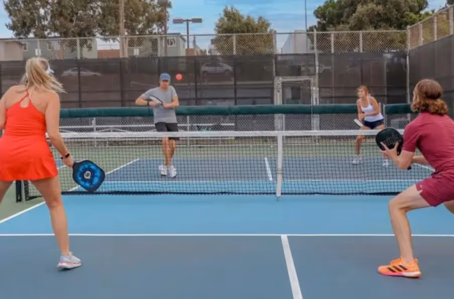 image of people playing pickleball